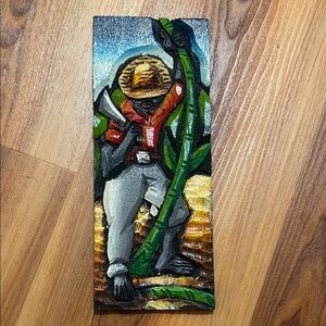 Vintage hand-carved and painted wooden folk art panels from Brazil.